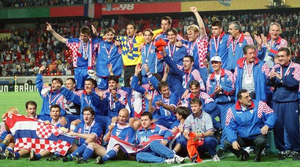 Players, trainers and assistants of the Croatian national soccer team jubilate and cheer as they pose for a group picture after winning the 1998 World Cup game for the third place against The Netherlands at the Parc des Princes stadium in Paris, France, 11 July 1998. Croatia won the 'small final' by a score of 2-1 against the team from The Netherlands and won the third place of the championship. (Photo by Achim Scheidemann/picture alliance via Getty Images)
