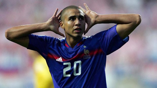 LEIRIA, Portugal:  French forward David Trezeguet celebrates after scoring against Croatia, 17 June 2004 during their European Nations football championships match at the Dr. Magalhaes Pessoa stadium in Leiria. France and Croatia are competing in Group B with Switzerland and England.   AFP PHOTO  ADRIAN DENNIS  (Photo credit should read Adrian DENNIS/AFP via Getty Images)