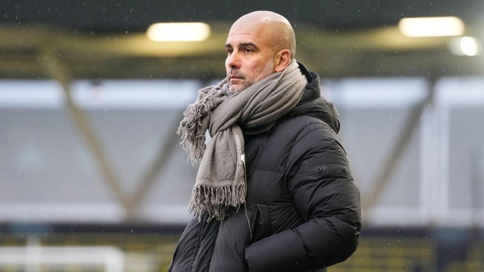 MANCHESTER, ENGLAND - DECEMBER 17: Pep Guardiola, Manager of Manchester City looks on during the friendly match between Manchester City and Girona at Manchester City Academy Stadium on December 17, 2022 in Manchester, England. (Photo by Matt McNulty - Manchester City/Manchester City FC via Getty Images)