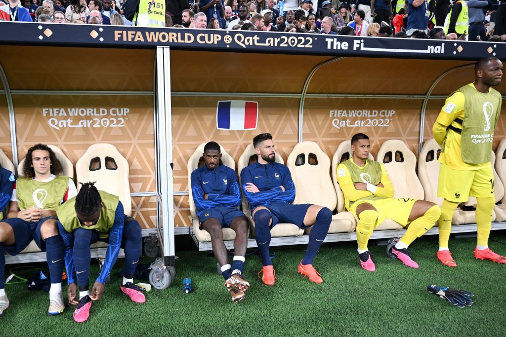 LUSAIL CITY, QATAR - DECEMBER 18: Ousmane Dembele and Olivier Giroud of France are seen on the bench during the FIFA World Cup Qatar 2022 Final match between Argentina and France at Lusail Stadium on December 18, 2022 in Lusail City, Qatar. (Photo by Michael Regan - FIFA/FIFA via Getty Images)