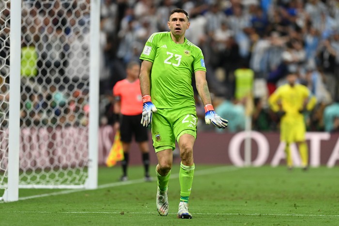 LUSAIL CITY, QATAR - DECEMBER 18: Emiliano Martinez of Argentina celebrates as Aurelien Tchouameni of France misses the teams third penalty in the penalty shoot out during the FIFA World Cup Qatar 2022 Final match between Argentina and France at Lusail Stadium on December 18, 2022 in Lusail City, Qatar. (Photo by David Ramos - FIFA/FIFA via Getty Images)