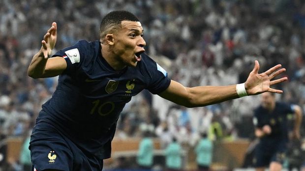 Soccer Football - FIFA World Cup Qatar 2022 - Final - Argentina v France - Lusail Stadium, Lusail, Qatar - December 18, 2022 France's Kylian Mbappe celebrates scoring their second goal REUTERS/Dylan Martinez