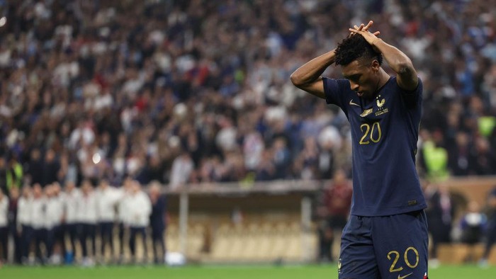 LUSAIL CITY, QATAR - DECEMBER 18: Kingsley Coman of France reacts after missing his penalty during the FIFA World Cup Qatar 2022 Final match between Argentina and France at Lusail Stadium on December 18, 2022 in Lusail City, Qatar. (Photo by Matthew Ashton - AMA/Getty Images)