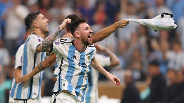 LUSAIL CITY, QATAR - DECEMBER 18: Lionel Messi of Argentina celebrates following his teams victory in the FIFA World Cup Qatar 2022 Final match between Argentina and France at Lusail Stadium on December 18, 2022 in Lusail City, Qatar. (Photo by Marc Atkins/Getty Images)