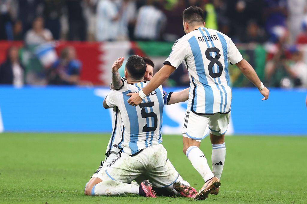 LUSAIL CITY, QATAR - DECEMBER 18: Lionel Messi of Argentina touches the trophy after the FIFA World Cup Qatar 2022 Final match between Argentina and France at Lusail Stadium on December 18, 2022 in Lusail City, Qatar. (Photo by Quality Sport Images/Getty Images)