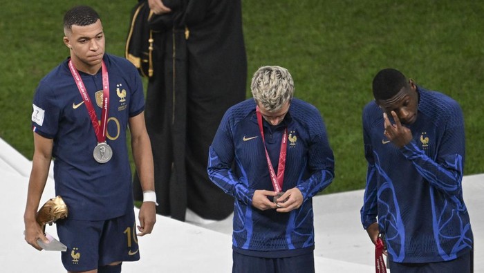 LUSAIL CITY, QATAR - DECEMBER 18: Kylian Mbappe(10) of France is seen with the Golden Boot award during a ceremony after the FIFA World Cup 2022 Final Match between Argentina and France at Lusail Stadium in Lusail City, Qatar on December 18, 2022. Argentina beat France after penalty shoot-out to win FIFA World Cup. (Photo by Ercin Erturk/Anadolu Agency via Getty Images)