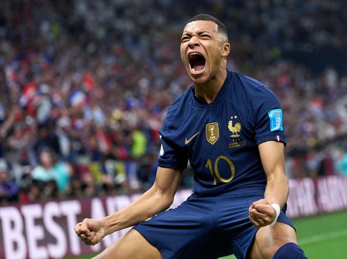 LUSAIL CITY, QATAR - DECEMBER 18:  Kylian Mbappe of France celebrates after scoring his team's second goal during the FIFA World Cup Qatar 2022 Final match between Argentina and France at Lusail Stadium on December 18, 2022 in Lusail City, Qatar. (Photo by Juan Luis Diaz/Quality Sport Images/Getty Images)