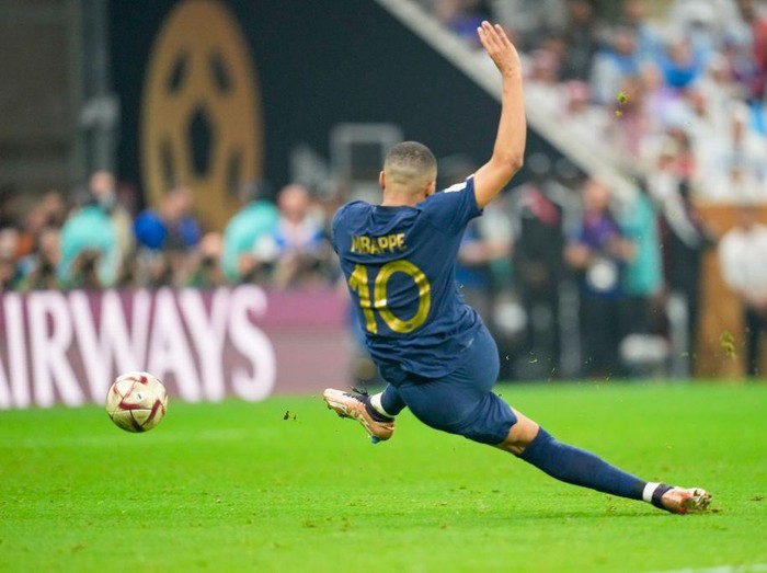 LUSAIL CITY, QATAR - DECEMBER 18: Kylian Mbappe of France scores his team's second goal during the FIFA World Cup Qatar 2022 Final match between Argentina and France at Lusail Stadium on December 18, 2022 in Lusail City, Qatar. (Photo by Ulrik Pedersen/Defodi Images via Getty Images)