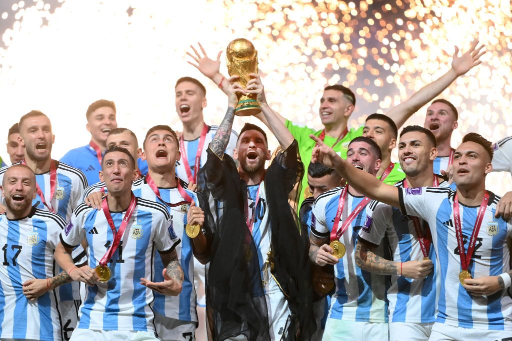 LUSAIL CITY, QATAR - DECEMBER 18: Lionel Messi of Argentina lifts the FIFA World Cup Qatar 2022 Winner's Trophy during the FIFA World Cup Qatar 2022 Final match between Argentina and France at Lusail Stadium on December 18, 2022 in Lusail City, Qatar. (Photo by Dan Mullan/Getty Images)