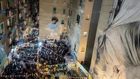 Fans Napoli tetap bisa berpesta bersama Argentina walau Italia gagal menembus putaran final Piala Dunia 2022. (Foto: ANSA/AFP via Getty Images/CESARE ABBATE)