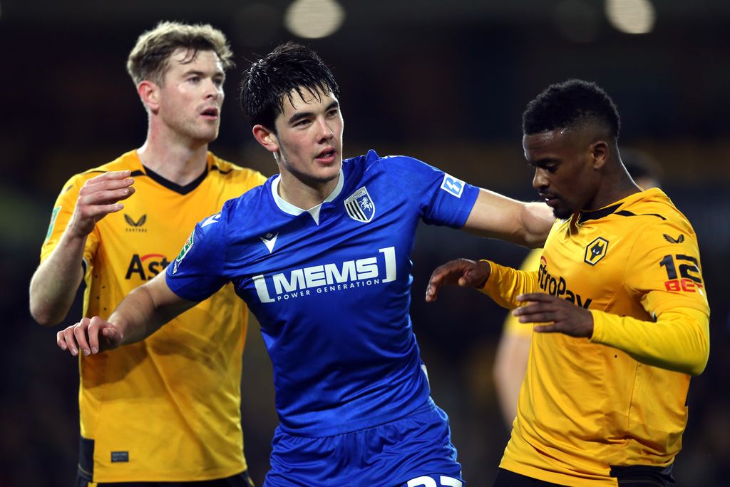 Gillingham's Elkan Baggott (centre) ahead of a corner kick during the Carabao Cup fourth round match at Molineux Stadium, Wolverhampton. Picture date: Tuesday December 20, 2022. (Photo by Barrington Coombs/PA Images via Getty Images)