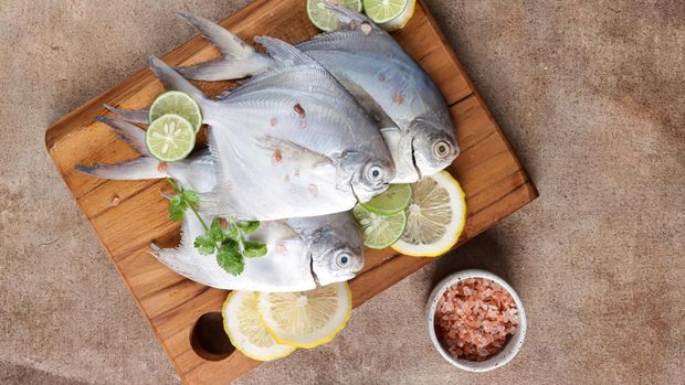 White pomfret or raw fish pomfret.