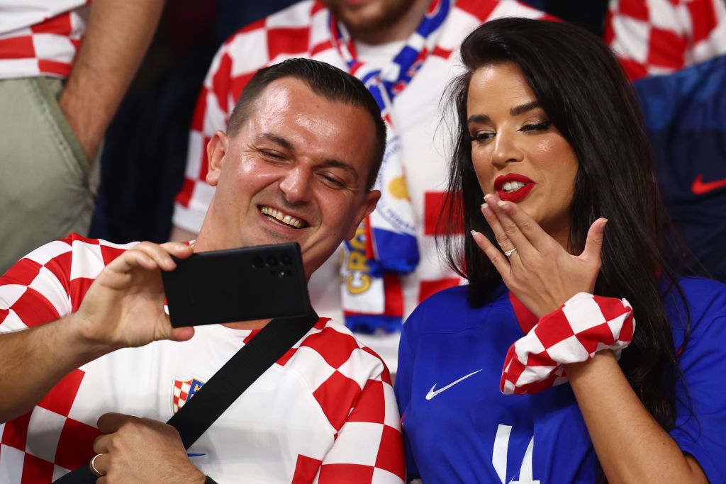 17 December 2022, Qatar, Al-Rajjan: Soccer: World Cup, Croatia - Morocco, final round, 3rd place match, Chalifa International Stadium, Ivana Knöll, a model from Croatia, poses in the stands before the match. Photo: Tom Weller/dpa (Photo by Tom Weller/picture alliance via Getty Images)