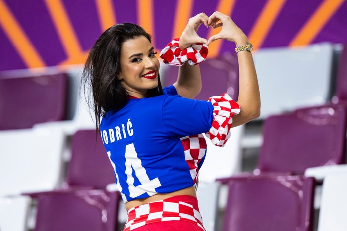 17 December 2022, Qatar, Al-Rajjan: Soccer: World Cup, Croatia - Morocco, final round, 3rd place match, Chalifa International Stadium, Ivana Knöll, a model from Croatia, poses in the stands before the match. Photo: Tom Weller/dpa (Photo by Tom Weller/picture alliance via Getty Images)
