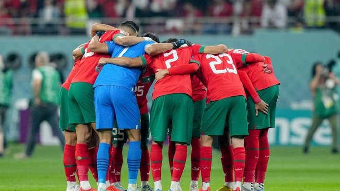DOHA, QATAR - DECEMBER 17: Morocco form a circle during the FIFA World Cup Qatar 2022 3rd Place match between Croatia and Morocco at Khalifa International Stadium on December 17, 2022 in Doha, Qatar. (Photo by Mohammad Karamali/DeFodi Images via Getty Images)