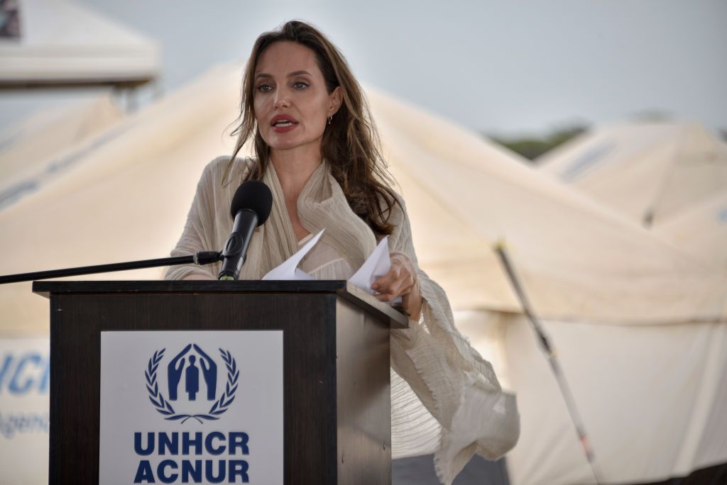 MAICAO, COLOMBIA - JUNE 08: United Nations High Commissioner for Refugees (UNCHR) Special Envoy Angelina Jolie delivers a speech during a press conference after visiting a refugee camp in the border between Colombia and Venezuela on June 8, 2019 in Maicao, Colombia. UN and International Organization for Migration (IOM) announced yesterday that 4 million of Venezuelans have left their country since 2015 due to the social, political and economic crisis, which means they are of the single largest population groups displaced from their country globally. The camp in Maicao has 60 tents  which can accommodate up to 350 people. Due to high demand, UNHCR is considering an expansion to give shelter to 1,400 people. Colombia it the top host of Venezuelan migrants and refugees, accounting 1.3 million. (Photo by Guillermo Legaria/Getty Images)