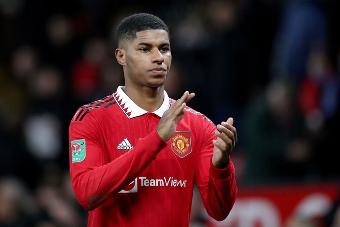 MANCHESTER, ENGLAND - DECEMBER 21: Marcus Rashford of Manchester United applauds their fans after the Carabao Cup Fourth Round match between Manchester United and Burnley at Old Trafford on December 21, 2022 in Manchester, England. (Photo by Jan Kruger/Getty Images)