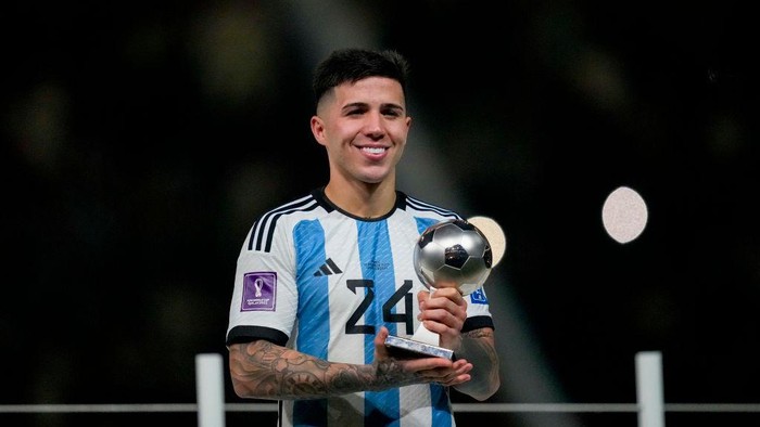 LUSAIL CITY, QATAR - DECEMBER 18: Enzo Fernandez of Argentina with the trophy for the best young player after the FIFA World Cup Qatar 2022 Final match between Argentina and France at Lusail Stadium on December 18, 2022 in Lusail City, Qatar. (Photo by Ulrik Pedersen/Defodi Images via Getty Images)