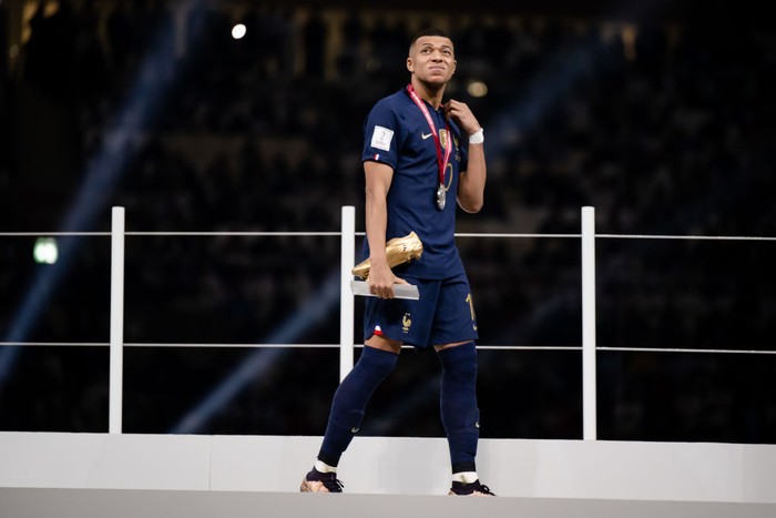 LUSAIL CITY, QATAR - DECEMBER 18: Kylian Mbappe of France looks dejected after the FIFA World Cup Qatar 2022 Final match between Argentina and France at Lusail Stadium on December 18, 2022 in Lusail City, Qatar. (Photo by Marvin Ibo Guengoer - GES Sportfoto/Getty Images)