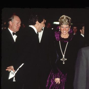 LONDON, UNITED KINGDOM - OCTOBER 27:  Diana, Princess Of Wales, Arriving At A Charity Gala Evening On Behalf Of Birthright At Garrard.  The Princess Is Wearing A Purple Evening Dress With A Gold And Amethyst Crucifix Suspended On A Pearl Rope.  (Photo by Tim Graham Photo Library via Getty Images)