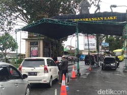 Hujan-Angin Kencang Bikin Pengunjung Telaga Sarangan Sepi Saat Libur Natal