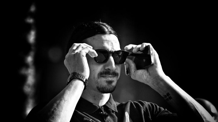DUBAI, UNITED ARAB EMIRATES - DECEMBER 12:  (EDITORS NOTE: Image has been converted to black and white.) Zlatan Ibrahimovic of AC Milan looks on before the AC Milan press conference on December 12, 2022 in Dubai, United Arab Emirates. (Photo by Claudio Villa/AC Milan via Getty Images)