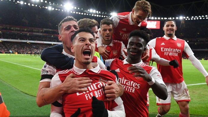 LONDON, ENGLAND - DECEMBER 26: (2ndL) Gabriel Martinelli celebrates scoring the 2nd Arsenal goal with (L) Granit Xhaka,  (2ndR) Rob Holding and (R) Bukayo Saka during the Premier League match between Arsenal FC and West Ham United at Emirates Stadium on December 26, 2022 in London, England. (Photo by Stuart MacFarlane/Arsenal FC via Getty Images)
