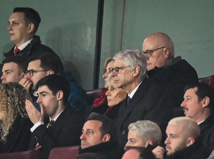 Former Arsenal's French head coach Arsene Wenger  watches the English Premier League football match between Arsenal and West Ham United at the Emirates Stadium in London on December 26, 2022. - - RESTRICTED TO EDITORIAL USE. No use with unauthorized audio, video, data, fixture lists, club/league logos or 'live' services. Online in-match use limited to 120 images. An additional 40 images may be used in extra time. No video emulation. Social media in-match use limited to 120 images. An additional 40 images may be used in extra time. No use in betting publications, games or single club/league/player publications. (Photo by Glyn KIRK / AFP) / RESTRICTED TO EDITORIAL USE. No use with unauthorized audio, video, data, fixture lists, club/league logos or 'live' services. Online in-match use limited to 120 images. An additional 40 images may be used in extra time. No video emulation. Social media in-match use limited to 120 images. An additional 40 images may be used in extra time. No use in betting publications, games or single club/league/player publications. / RESTRICTED TO EDITORIAL USE. No use with unauthorized audio, video, data, fixture lists, club/league logos or 'live' services. Online in-match use limited to 120 images. An additional 40 images may be used in extra time. No video emulation. Social media in-match use limited to 120 images. An additional 40 images may be used in extra time. No use in betting publications, games or single club/league/player publications. (Photo by GLYN KIRK/AFP via Getty Images)