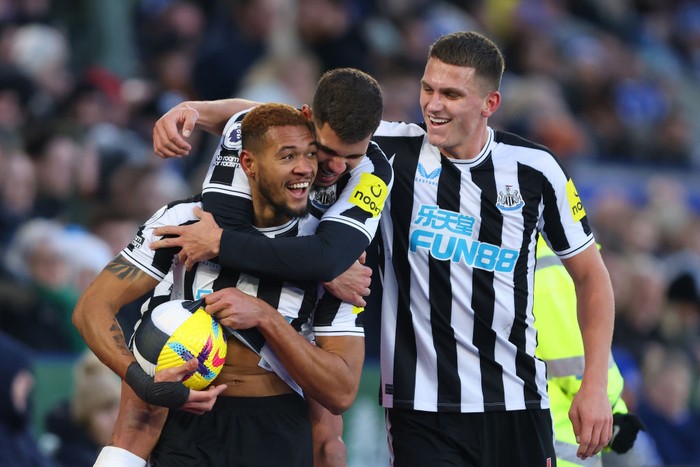 LEICESTER, ENGLAND - DECEMBER 26:  Joelinton of Newcastle United celebrates scoring the 3rd goal with Bruno Guimaraes and Sven Botman during the Premier League match between Leicester City and Newcastle United at The King Power Stadium on December 26, 2022 in Leicester, United Kingdom. (Photo by Marc Atkins/Getty Images)