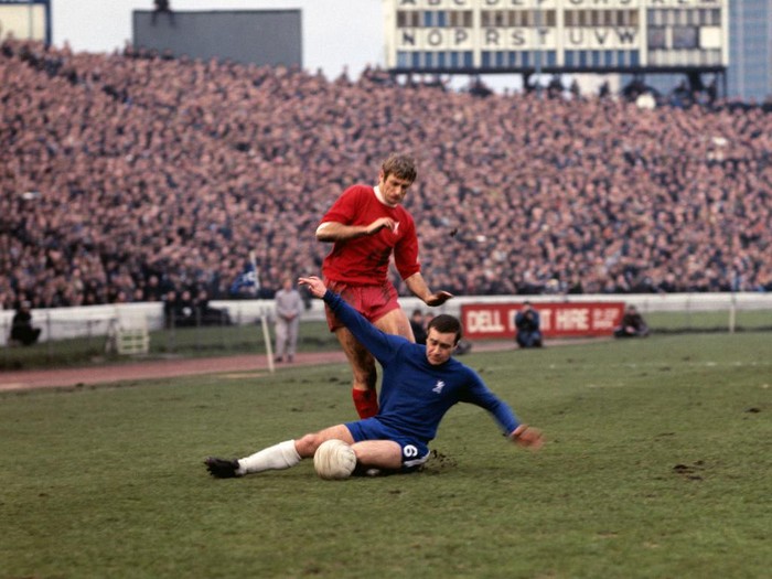 Chelsea's Ron Harris (on floor) tackles Liverpool's Roger Hunt   (Photo by PA Images via Getty Images)