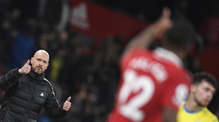 Manchester Uniteds Dutch manager Erik ten Hag gestures as he reacts during the English Premier League football match between Manchester United and Nottingham Forest at Old Trafford in Manchester, north west England, on December 27, 2022. - RESTRICTED TO EDITORIAL USE. No use with unauthorized audio, video, data, fixture lists, club/league logos or live services. Online in-match use limited to 120 images. An additional 40 images may be used in extra time. No video emulation. Social media in-match use limited to 120 images. An additional 40 images may be used in extra time. No use in betting publications, games or single club/league/player publications. (Photo by Oli SCARFF / AFP) / RESTRICTED TO EDITORIAL USE. No use with unauthorized audio, video, data, fixture lists, club/league logos or live services. Online in-match use limited to 120 images. An additional 40 images may be used in extra time. No video emulation. Social media in-match use limited to 120 images. An additional 40 images may be used in extra time. No use in betting publications, games or single club/league/player publications. / RESTRICTED TO EDITORIAL USE. No use with unauthorized audio, video, data, fixture lists, club/league logos or live services. Online in-match use limited to 120 images. An additional 40 images may be used in extra time. No video emulation. Social media in-match use limited to 120 images. An additional 40 images may be used in extra time. No use in betting publications, games or single club/league/player publications. (Photo by OLI SCARFF/AFP via Getty Images)