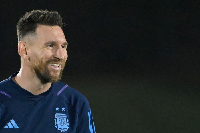 Argentinas forward #10 Lionel Messi smiles during a training session at Qatar University in Doha on December 8, 2022, on the eve of the Qatar 2022 World Cup quarter-final football match between The Netherlands and Argentina. (Photo by JUAN MABROMATA / AFP) (Photo by JUAN MABROMATA/AFP via Getty Images)