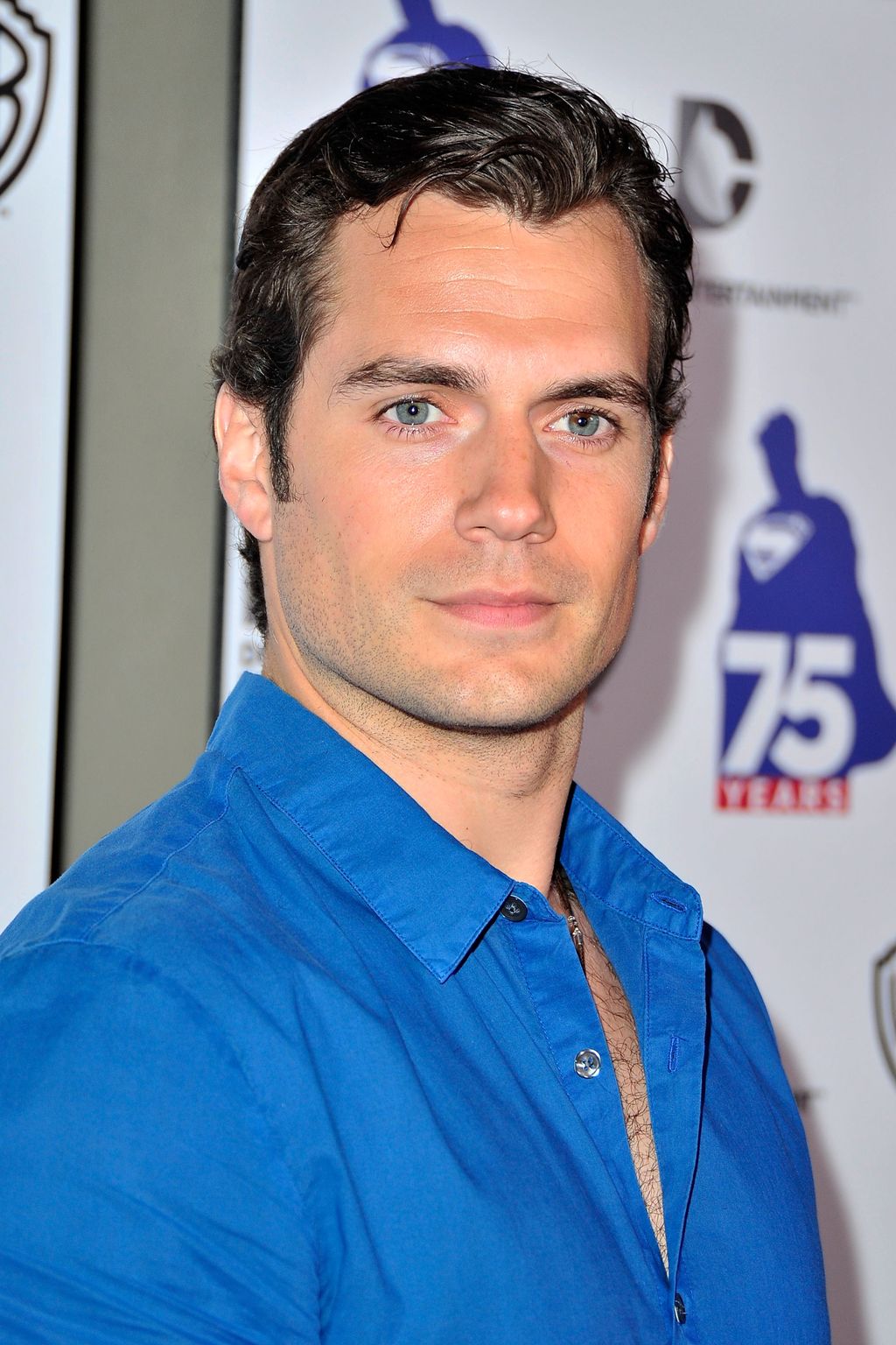 SAN DIEGO, CA - JULY 19:  Actor Henry Cavill arrives at DC Entertainment and Warner Bros. host Superman 75 party at San Diego Comic-Con at Hard Rock Hotel San Diego on July 19, 2013 in San Diego, California.  Celebrities, executives and comic book creators packed the Hard Rock Hotel’s Float Bar in downtown San Diego Friday night to celebrate 75 years of Superman. The guest list included a who’s who of Hollywood elite and Superman lore, from its current comic creators to the original 1978 film to the current Man of Steel, Henry Cavill.  (Photo by Jerod Harris/Getty Images for DC Entertainment)