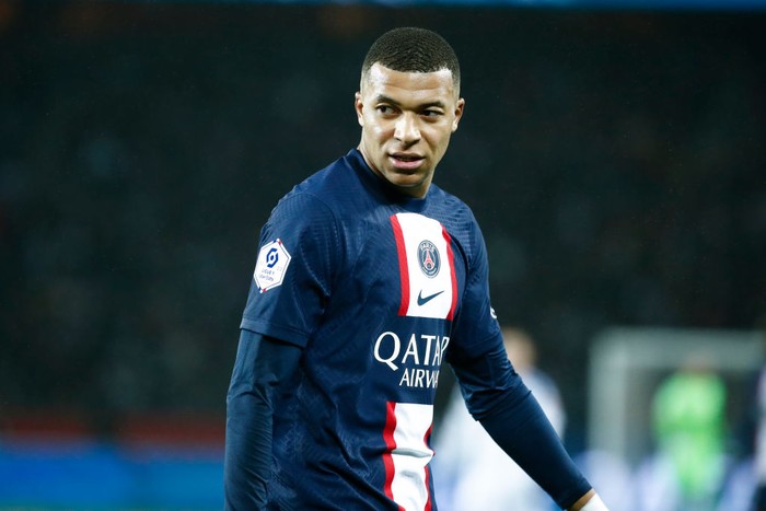 PARIS, FRANCE - DECEMBER 28: Kylian Mbappe #7 of Paris Saint-Germain looks on during the Ligue 1 match between Paris Saint-Germain and RC Strasbourg at Parc des Princes on December 28, 2022 in Paris, France. (Photo by Catherine Steenkeste/Getty Images)