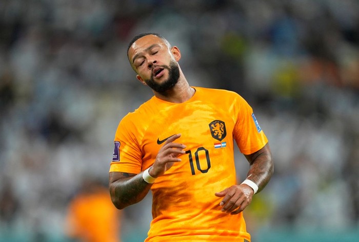 LUSAIL CITY, QATAR - DECEMBER 09: Memphis Depay of Netherlands looks on during the FIFA World Cup Qatar 2022 quarter final match between Netherlands and Argentina at Lusail Stadium on December 9, 2022 in Lusail City, Qatar. (Photo by Ulrik Pedersen/DeFodi Images via Getty Images)