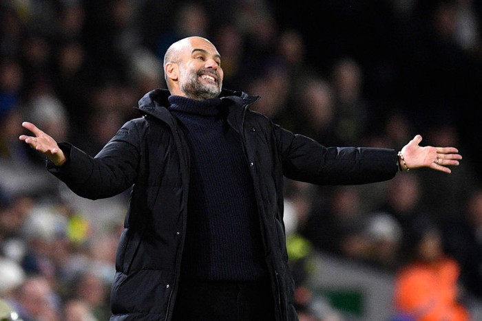Manchester Citys Spanish manager Pep Guardiola reacts during the English Premier League football match between Leeds United and Manchester City at Elland Road in Leeds, northern England on December 28, 2022. - RESTRICTED TO EDITORIAL USE. No use with unauthorized audio, video, data, fixture lists, club/league logos or live services. Online in-match use limited to 120 images. An additional 40 images may be used in extra time. No video emulation. Social media in-match use limited to 120 images. An additional 40 images may be used in extra time. No use in betting publications, games or single club/league/player publications. (Photo by Oli SCARFF / AFP) / RESTRICTED TO EDITORIAL USE. No use with unauthorized audio, video, data, fixture lists, club/league logos or live services. Online in-match use limited to 120 images. An additional 40 images may be used in extra time. No video emulation. Social media in-match use limited to 120 images. An additional 40 images may be used in extra time. No use in betting publications, games or single club/league/player publications. / RESTRICTED TO EDITORIAL USE. No use with unauthorized audio, video, data, fixture lists, club/league logos or live services. Online in-match use limited to 120 images. An additional 40 images may be used in extra time. No video emulation. Social media in-match use limited to 120 images. An additional 40 images may be used in extra time. No use in betting publications, games or single club/league/player publications. (Photo by OLI SCARFF/AFP via Getty Images)