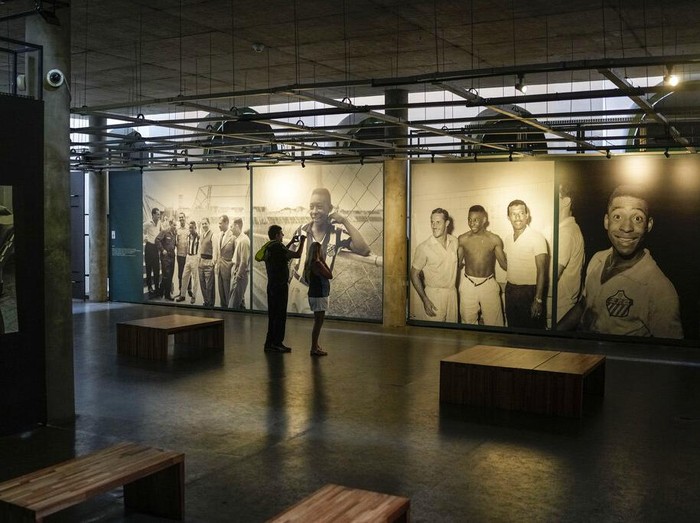 Visitors tour the Pele Museum in Santos, Brazil, Monday, Dec. 26, 2022. (AP Photo/Matias Delacroix)