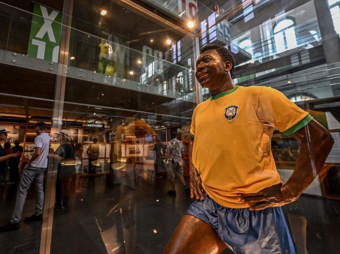 View of a wax figure of Brazil's football legend Edson Arantes do Nascimento 'Pele' at the Pele Museum, in Santos, Brazil, on December 27, 2022. - Family members spent Christmas on Sunday with Pele at the Sao Paulo hospital where the legendary footballer is battling worsening cancer as well as kidney and heart problems, according to social media posts by his children. Fans of the player, considered by many the greatest of all time, have been expressing hope for his recovery since he was hospitalized in late November. (Photo by NELSON ALMEIDA / AFP) (Photo by NELSON ALMEIDA/AFP via Getty Images)