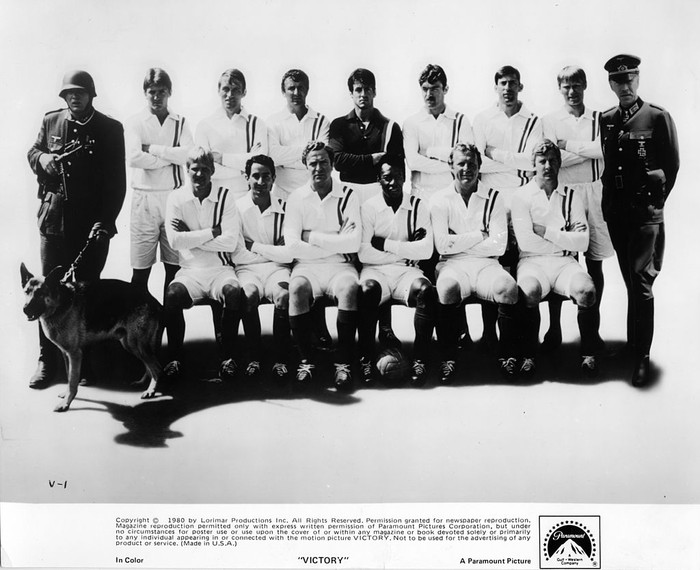 Pele, Stallone CIRCA 1980: (C) Sylvester Stallone, Michael Caine and Pele pose with allied prisoner of war soccer teammates for the Paramount Pictures movie