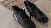 Sepatu ini dipakai Pele di Piala Dunia 1970. Saat itu Piala Dunia berlangsung di Meksiko. Suamy Beydoun/picture alliance via Getty Images.