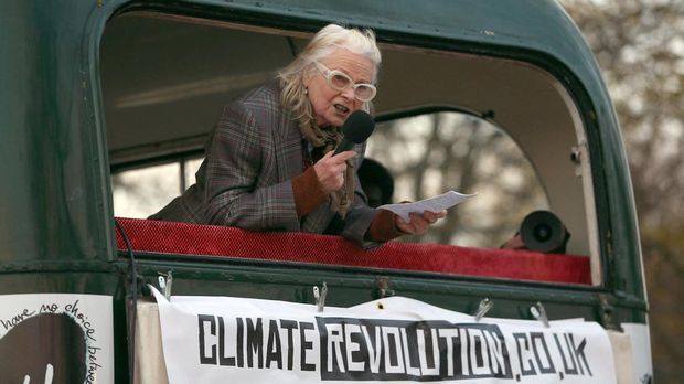 FILE PHOTO: Fashion designer Vivienne Westwood speaks at an event at which a collection of punk memorabilia belonging to Joe Corre, the son of Malcolm McLaren, the former manager of the Sex Pistols and Westwood, was burnt on a boat on the River Thames, in London, Britain November 26, 2016. REUTERS/Neil Hall/File Photo