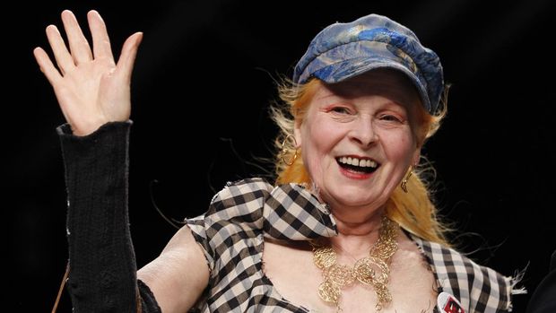 FILE - British fashion designer Vivienne Westwood waves to the audience after presenting the Vivienne Westwood fashion collection from the men's Spring/Summer 2013 collection, part of the Milan Fashion Week, unveiled in Milan,  June 24, 2012. Westwood, an influential fashion maverick who played a key role in the punk movement, died Thursday, Dec. 29, 2022, at 81. (AP Photo/Luca Bruno, File)