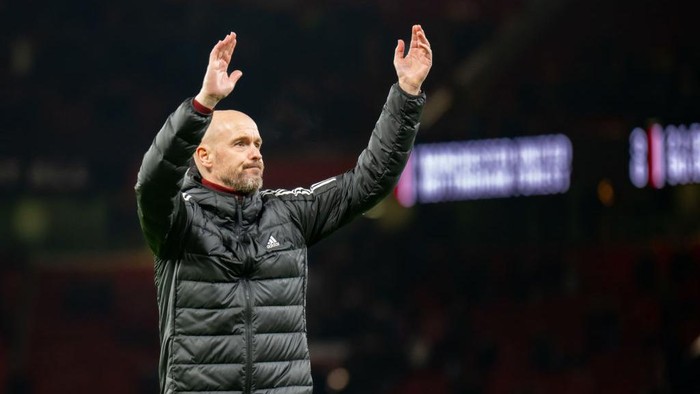 MANCHESTER, ENGLAND - DECEMBER 27:  Manchester United Head Coach / Manager Erik ten Hag salutes the fans at the end of the Premier League match between Manchester United and Nottingham Forest at Old Trafford on December 27, 2022 in Manchester, United Kingdom. (Photo by Ash Donelon/Manchester United via Getty Images)