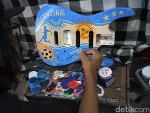 Keren! Gitar Ini Disulap Jadi Kanvas Berlukiskan Argentina Keren! Gitar Ini Disulap Jadi Kanvas Berlukiskan Argentina