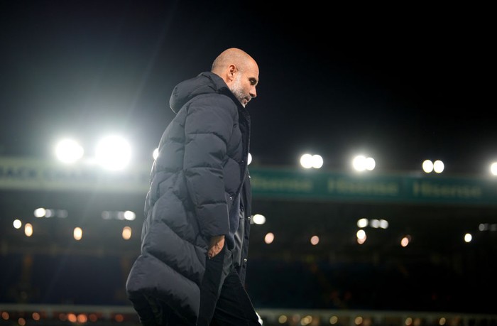 LEEDS, ENGLAND - DECEMBER 28: Pep Guardiola, Manager of Manchester City look on ahead of  the Premier League match between Leeds United and Manchester City at Elland Road on December 28, 2022 in Leeds, England. (Photo by Tom Flathers/Manchester City FC via Getty Images)