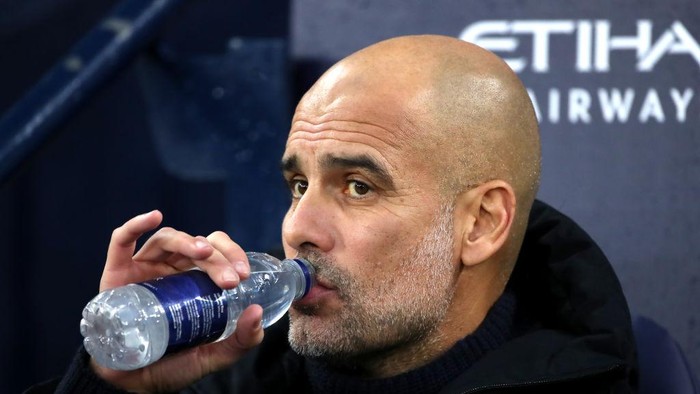 MANCHESTER, ENGLAND - DECEMBER 31: Pep Guardiola, Manager of Manchester City, looks on prior to the Premier League match between Manchester City and Everton FC at Etihad Stadium on December 31, 2022 in Manchester, England. (Photo by Jan Kruger/Getty Images)