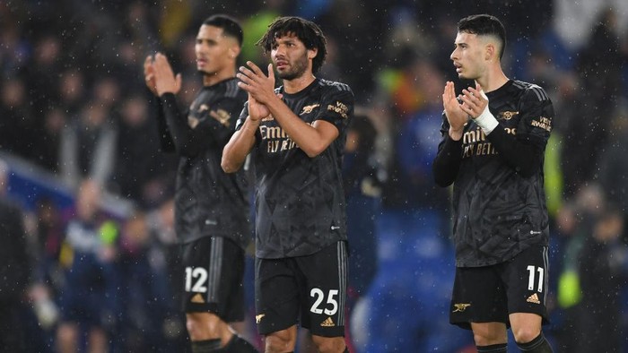 BRIGHTON, ENGLAND - DECEMBER 31: Mohamed Elneny and Gabriel Martinelli of Arsenal clap the fans after the Premier League match between Brighton & Hove Albion and Arsenal FC at American Express Community Stadium on December 31, 2022 in Brighton, England. (Photo by David Price/Arsenal FC via Getty Images)