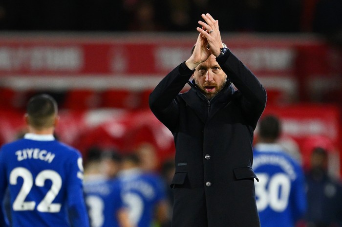 Graham Potter NOTTINGHAM, ENGLAND - JANUARY 01: Graham Potter, Manager of Chelsea applauds fans after the Premier League match between Nottingham Forest and Chelsea FC at City Ground on January 01, 2023 in Nottingham, England. (Photo by Clive Mason/Getty Images)