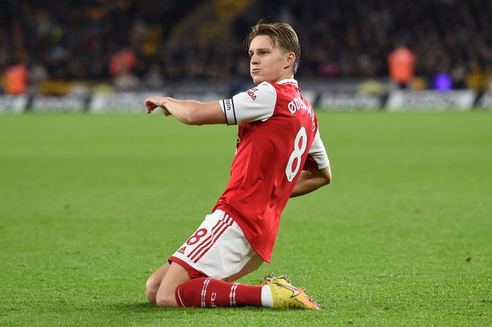 Martin Odegaard WOLVERHAMPTON, ENGLAND - NOVEMBER 12: Martin Odegaard of Arsenal celebrates after scoring his team's second goal during the Premier League match between Wolverhampton Wanderers and Arsenal FC at Molineux on November 12, 2022 in Wolverhampton, England. (Photo by Harriet Lander/Getty Images)