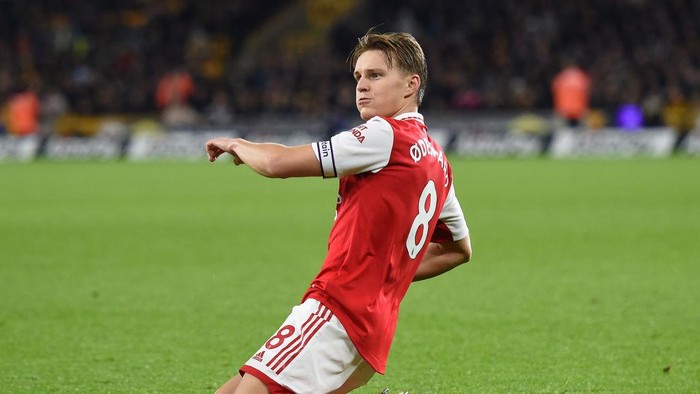 WOLVERHAMPTON, ENGLAND - NOVEMBER 12: Martin Odegaard of Arsenal celebrates after scoring his teams second goal during the Premier League match between Wolverhampton Wanderers and Arsenal FC at Molineux on November 12, 2022 in Wolverhampton, England. (Photo by Harriet Lander/Getty Images)
